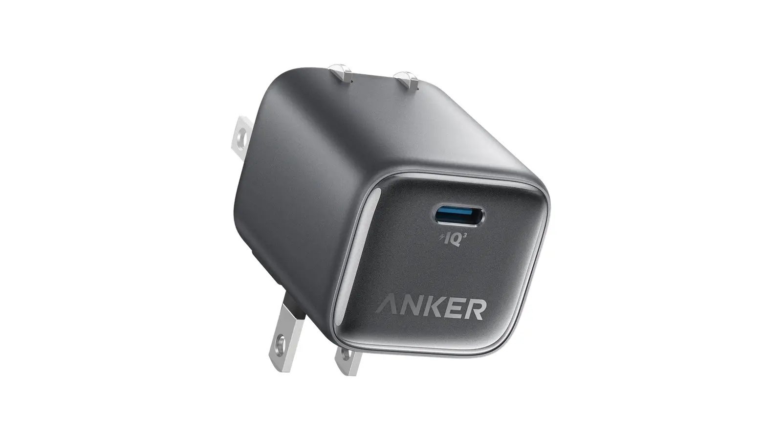 A black Anker Nano Charger Neo seen at an angle on a white background, with its folding prongs out and one USB-C port on the front.