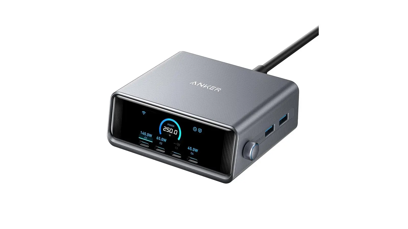 A gray Anker Prime desktop charger seen at an angle, with a front display showing 250.0 W total and four USB-C ports below it.