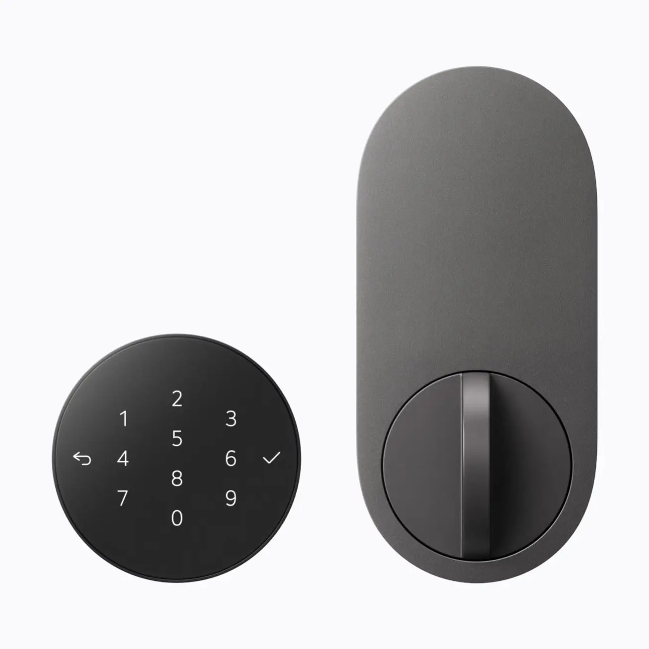 A graphite smart deadbolt with its round black keypad shown beside the interior thumb-turn plate.