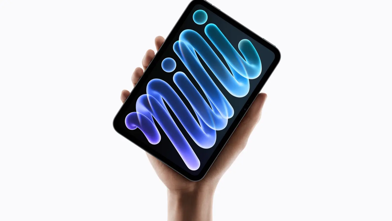 A hand holds up Apple's new iPad mini, its screen showing a glowing blue and purple abstract wallpaper, against a white background.