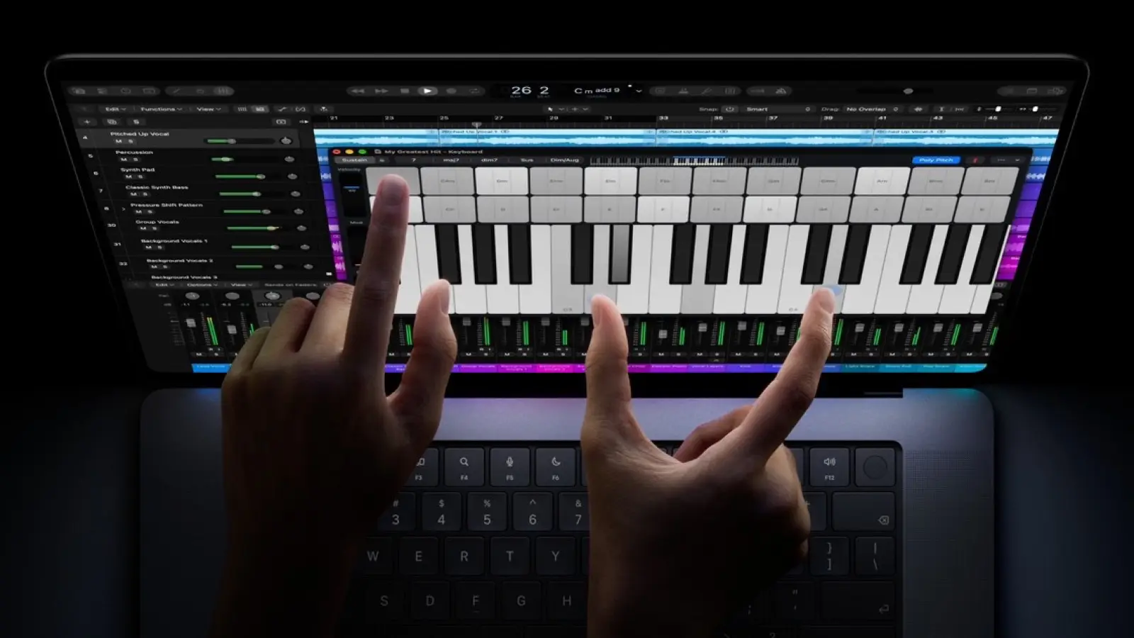 Apple's MacBook Pro with PROLED XDR Display, shown in an Apple press image promoting its touch experience.