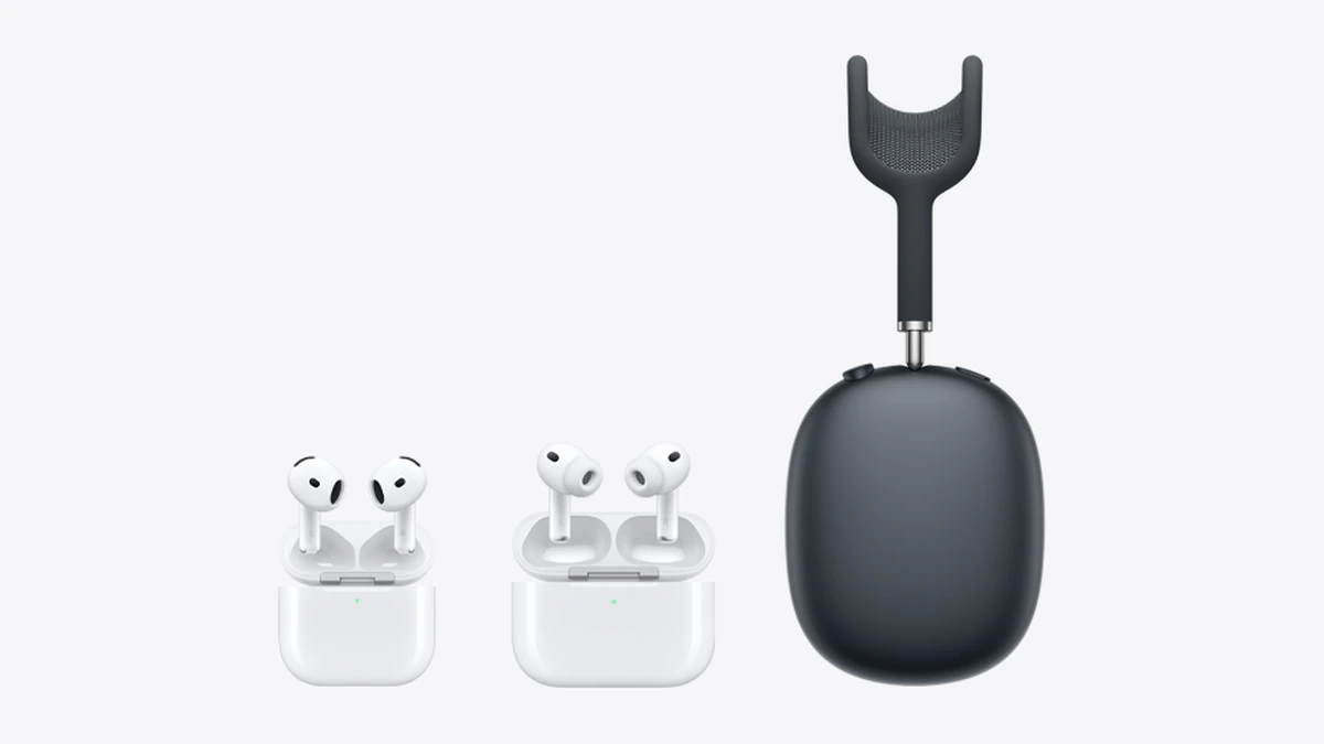 AirPods 4 and AirPods Pro in their charging cases beside a dark grey AirPods Max headphone, on a light grey background.