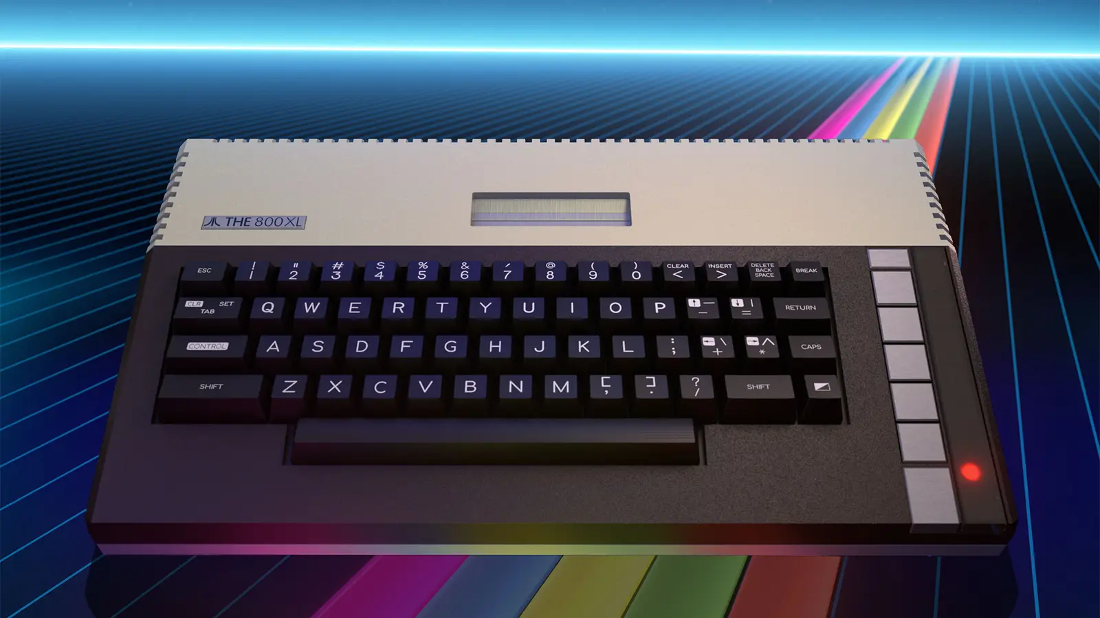 Atari's press render of THE 800XL console alone on a dark grid with rainbow stripes, with no box or accessories.
