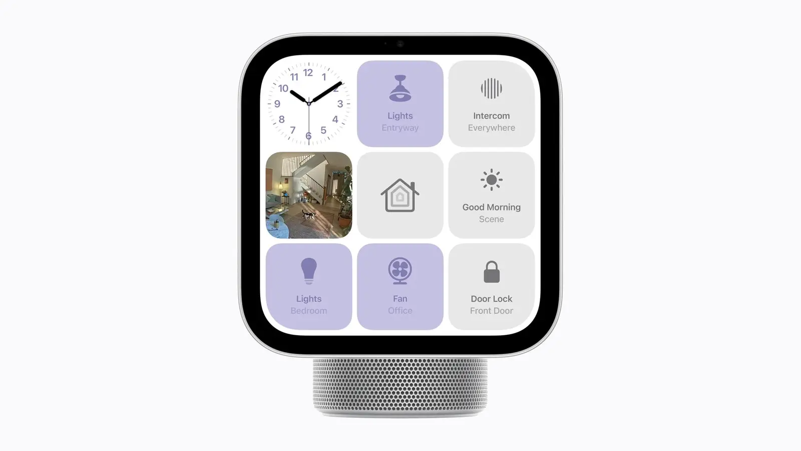 An Apple HomeView display on its speaker base, its screen showing a grid of tiles for a clock, lights, intercom, a living-room camera view, a Good Morning scene, a fan and a door lock.