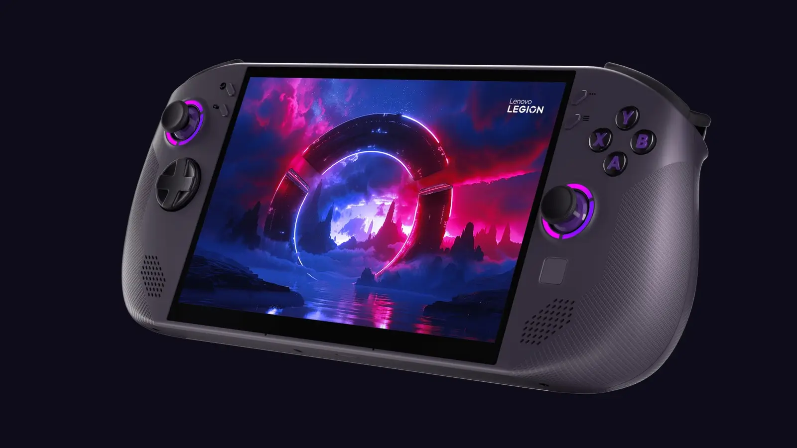 A dark gray Lenovo Legion Go S handheld seen from the front at an angle, with purple-lit joysticks and a purple and pink landscape on its screen.