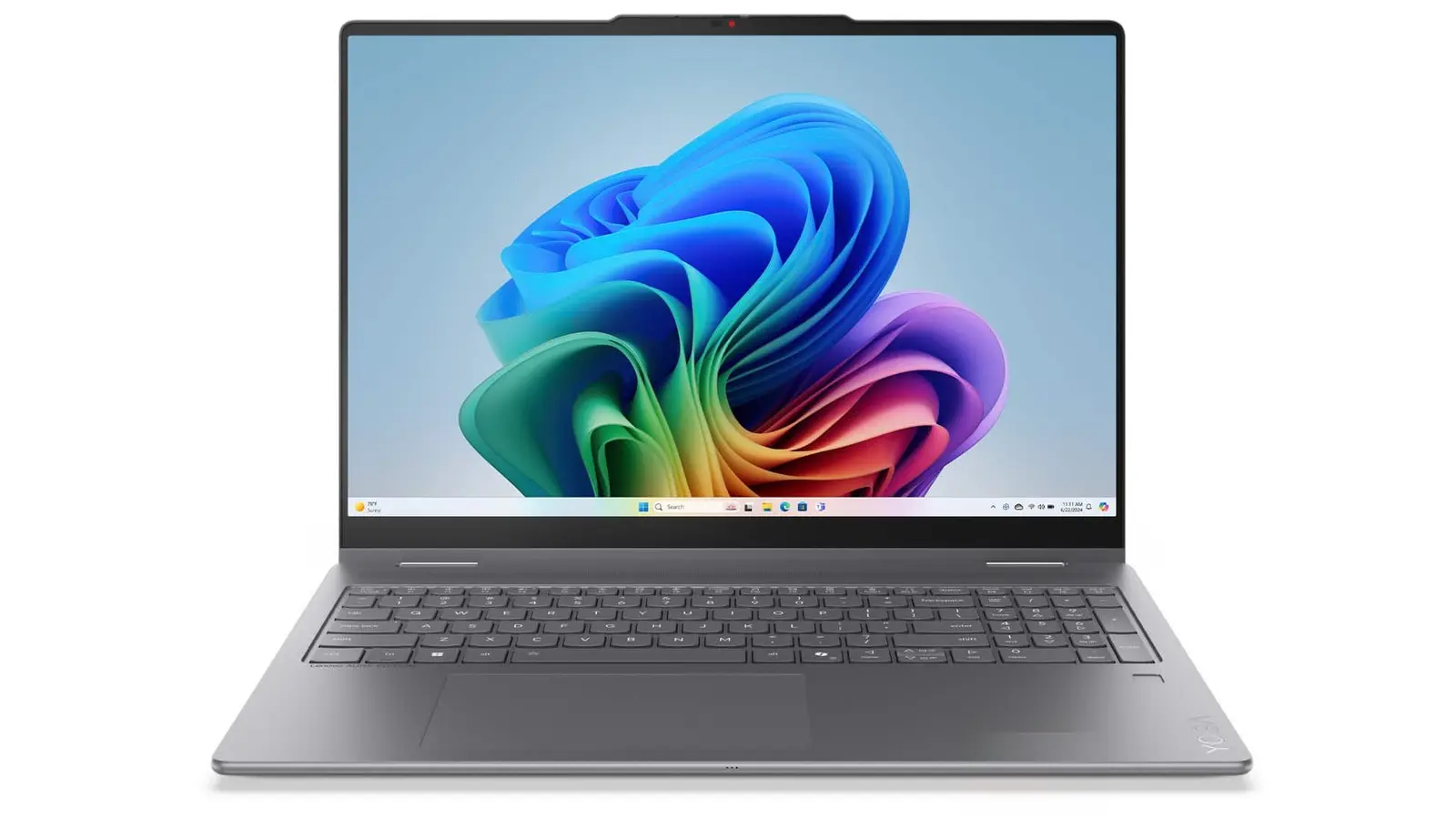 Front view of a gray 16-inch Lenovo Yoga 7i 2-in-1 laptop, open, with a colorful Windows 11 wallpaper on the screen.