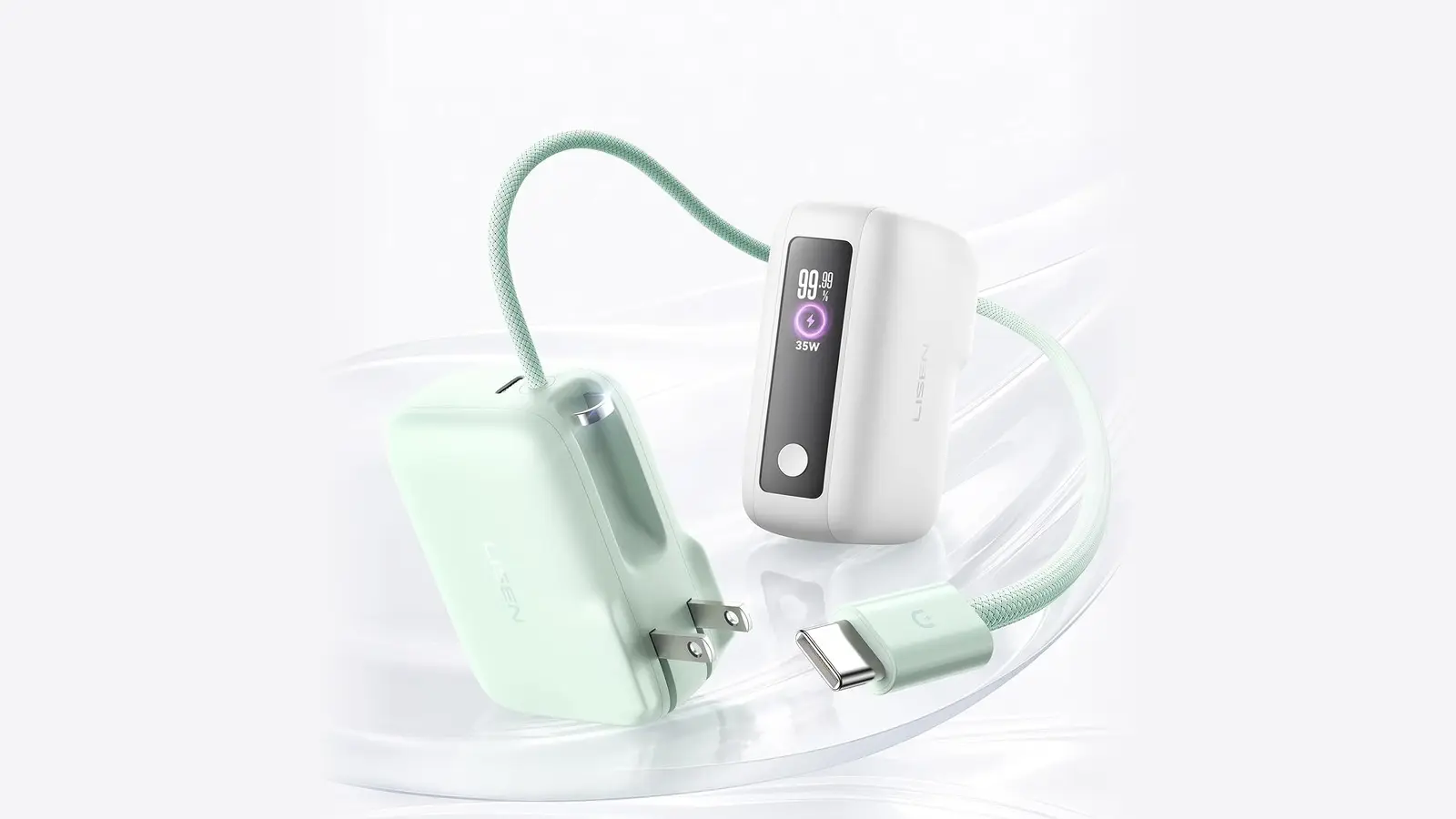 Two Lisen all-in-one chargers: a mint green one with folding wall prongs and braided USB-C cable, and a white one with a small display reading 99.99 percent and 35W.