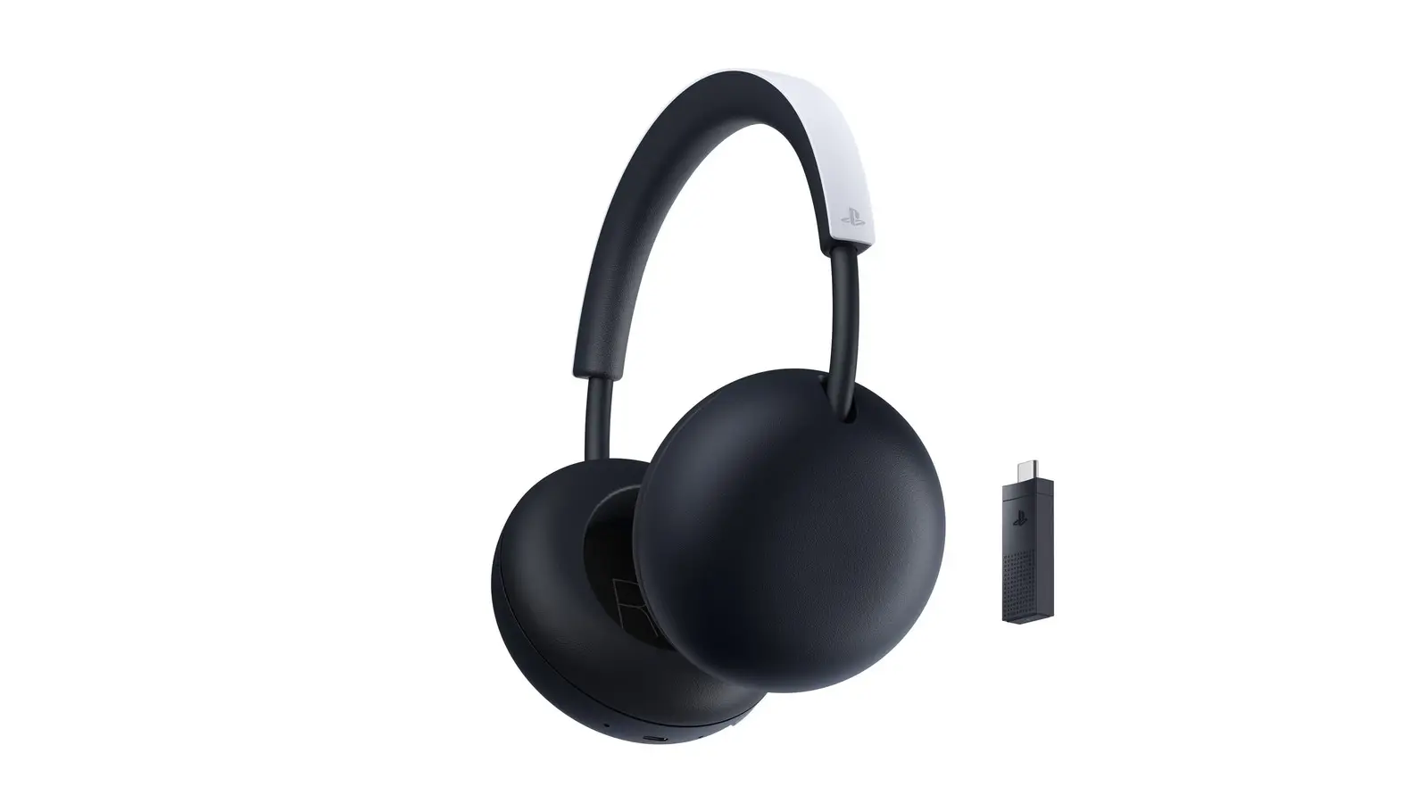 The PlayStation Pulse wireless headset in black with a white headband, next to its small PlayStation Link USB adapter.