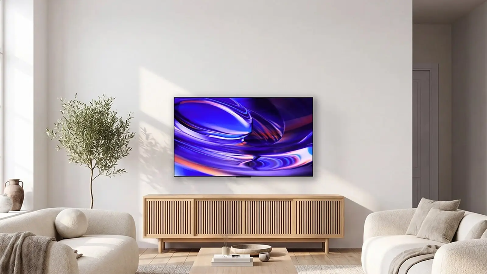 A wall-mounted Sony Bravia OLED TV showing a swirl of blue and purple light above a wooden sideboard in a bright living room.