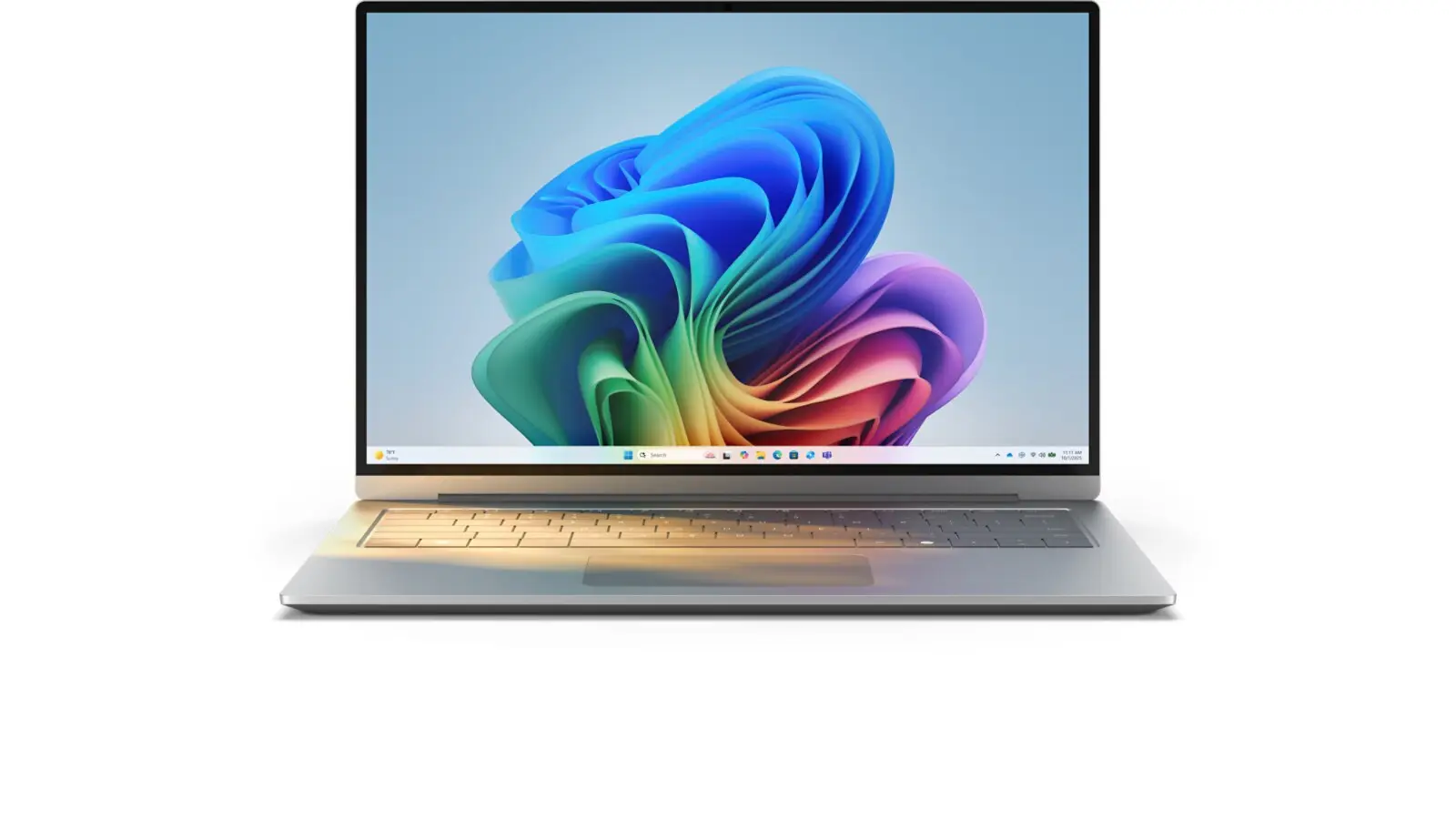 A Windows 11 laptop showing the colourful Bloom wallpaper and taskbar on a white background.